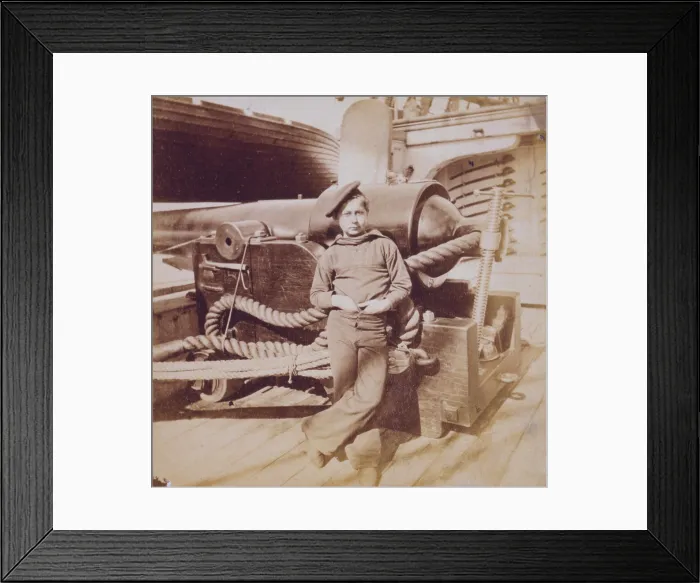 Framed Print : The Civil War, a powder monkey, leaning against a cannon, on the U.S.S. New Hampshire, off Charleston, South Carolina, 1864-1865 Framed Print : The Civil War, a powder monkey, leaning against a cannon, on the U.S.S. New Hampshire, off Charleston, South Carolina, 1864-1865