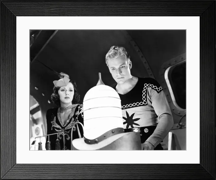 Framed Print : FLASH GORDON CONQUERS THE UNIVERSE, from left, Carol Hughes, Buster Crabbe, 1940