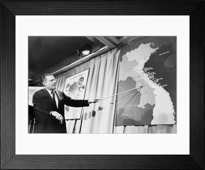 Framed Print : Secretary of Defense Robert McNamera pointing to a map of Vietnam at a press conference, photograph by Marion S. Trikosko, April 26, 1965 Framed Print : Secretary of Defense Robert McNamera pointing to a map of Vietnam at a press conference, photograph by Marion S. Trikosko, April 26, 1965