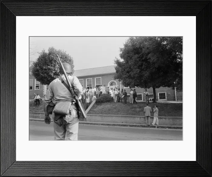 Framed Print : African American school integration conflicts, an armed member of the National Guard observing Clinton High School as students stand on steps and lawn, Tennessee Framed Print : African American school integration conflicts, an armed member of the National Guard observing Clinton High School as students stand on steps and lawn, Tennessee