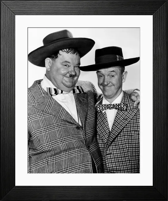 Framed Print : JITTERBUGS, from left: Oliver Hardy, Stan Laurel, 1943. TM & copyright 20th Century Fox Film Corp. All rights reserved / courtesy Everett Collection Framed Print : JITTERBUGS, from left: Oliver Hardy, Stan Laurel, 1943. TM & copyright 20th Century Fox Film Corp. All rights reserved / courtesy Everett Collection
