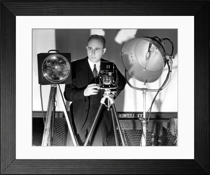 Framed Print : Dr. Harold Edgarton, of M.I.T. stands behind his camera that boasts ultra-speed photography, with pictures being taken at 1 / 100, 000th of a second. 12 / 7 / 38 Framed Print : Dr. Harold Edgarton, of M.I.T. stands behind his camera that boasts ultra-speed photography, with pictures being taken at 1 / 100, 000th of a second. 12 / 7 / 38