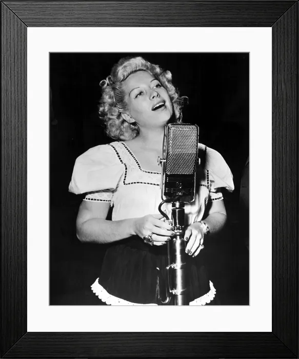 Framed Print : Helen Forrest singing for the G.I.'s in 1944. Courtesy: CSU Archives / Everett Collection Framed Print : Helen Forrest singing for the G.I.'s in 1944. Courtesy: CSU Archives / Everett Collection