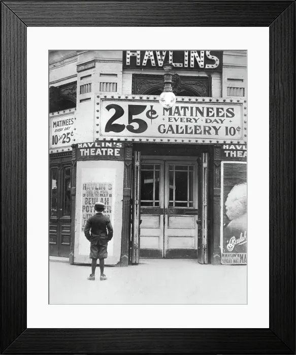 Framed Print : Boy in front of a movie theater showing a film with Beulah Poynter, original caption quote: Where the boys spend their money, St