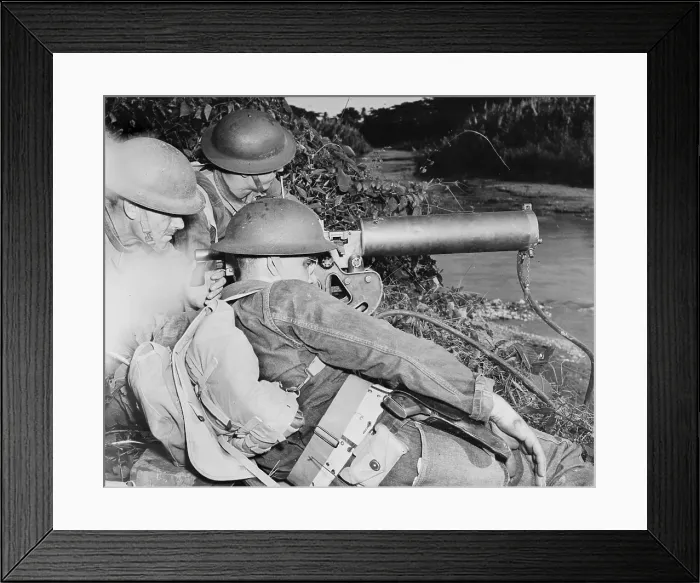 Framed Print : World War II, a machine gun crew of American troops in the British West Indies, gaurding a strategic point along a river during the course of maneuvers, circa 1942 Framed Print : World War II, a machine gun crew of American troops in the British West Indies, gaurding a strategic point along a river during the course of maneuvers, circa 1942