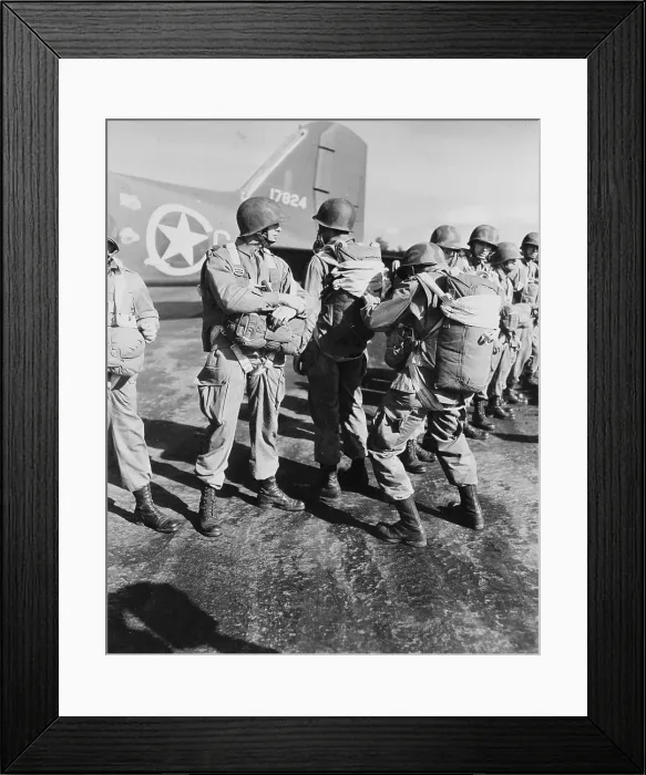 Framed Print : World War II, U.S. paratroopers inspecting parachutes before taking off on maneuvers in England, circa 1942 Framed Print : World War II, U.S. paratroopers inspecting parachutes before taking off on maneuvers in England, circa 1942