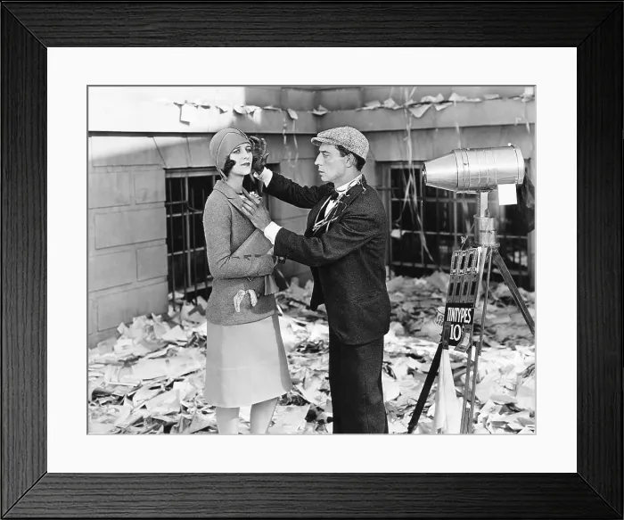 Framed Print : THE CAMERAMAN, from left: Marceline Day, Buster Keaton, 1928