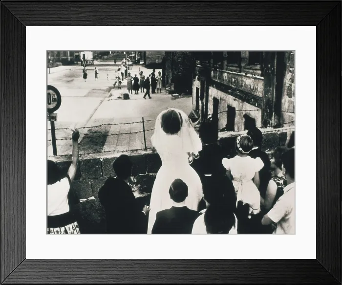 Framed Print : Berlin Wall. A newly-wed couple greets their families of the Soviet sector. AISA / Everett Collection**US SALES ONLY** Framed Print : Berlin Wall. A newly-wed couple greets their families of the Soviet sector. AISA / Everett Collection**US SALES ONLY**