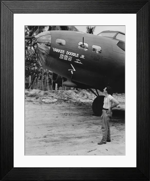 Framed Print : World War II, original caption: The Flying Fortress being admired here is the Yankee Doodle, Jr