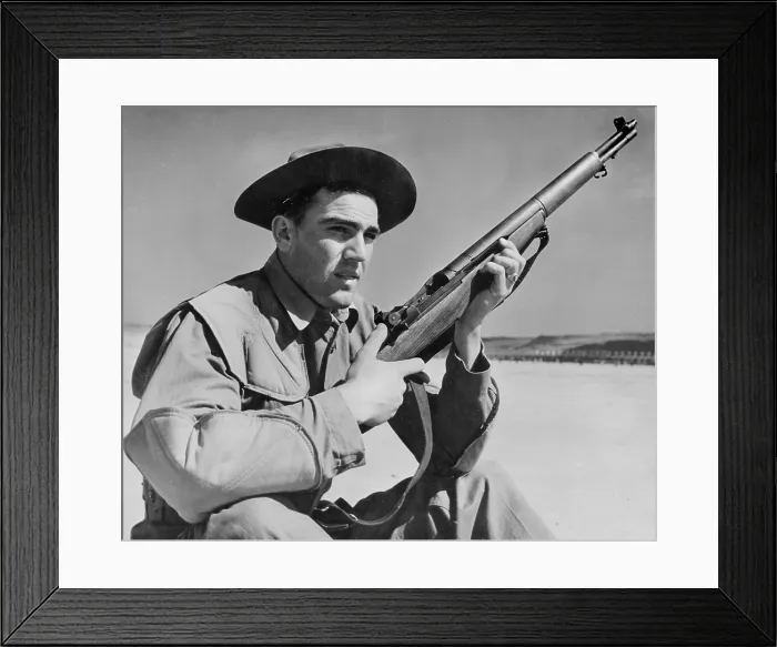 Framed Print : World War II, U.S. soldier ready with rifle, circa 1940-1946