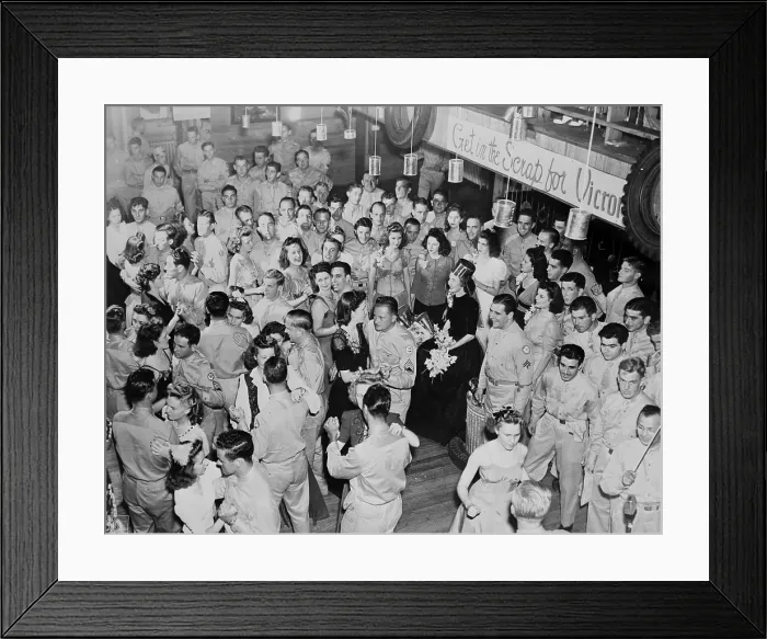 Framed Print : World War II, U.S. soldiers dancing. The banner to the right reads: Get in the scrap for victory, circa 1940-1946
