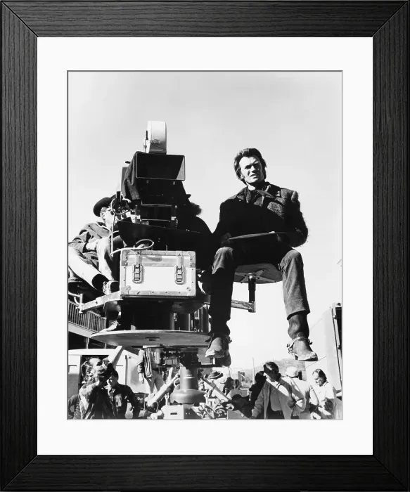 Framed Print : JOE KIDD, Clint Eastwood riding the camera boom on set, 1972