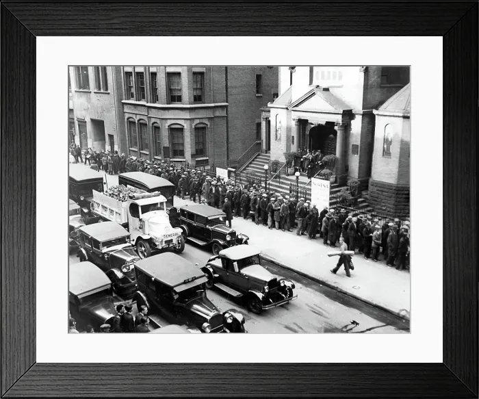 Framed Print : DEPRESSION- Jobless men lined up in front of St. Francis of Assisi Church waiting to receive a nickel each from Father Gabriel. New York, 1930s