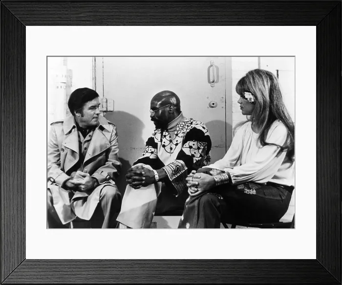 Framed Print : Mike Douglas and Dyan Cannon interview Rubin Hurricane Carter at the State Prison in Trenton, New Jersey, 1975. Courtesy: CSU Archives / Everett Collection