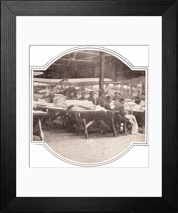 Framed Print : World War I, French women working at an airplane assembly plant sewing sleeves to cover the skeletons of rebuilt aircraft