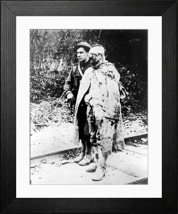 Framed Print : World War I, Another sort of war ruin - after several days in the trenches, a British Red Cross orderly escorting a wounded Framed Print : World War I, Another sort of war ruin - after several days in the trenches, a British Red Cross orderly escorting a wounded