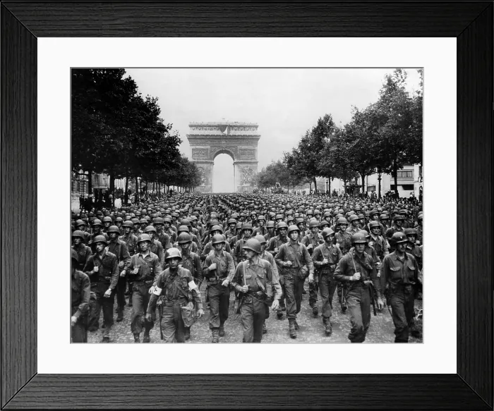 Framed Print : World War II: American troops marching down the Champs Elysees celebrating liberation in Paris, France, September 1944.. Courtesy: CSU Archives / Everett Collection Framed Print : World War II: American troops marching down the Champs Elysees celebrating liberation in Paris, France, September 1944.. Courtesy: CSU Archives / Everett Collection