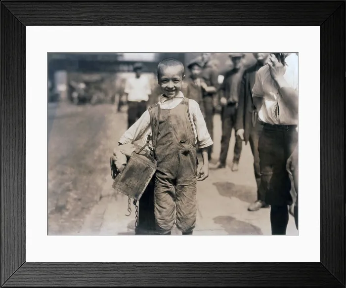 Framed Print : Child labor, Bootblack near Trinity Church, New York City. photograph by Lewis Wickes Hine, July, 1924