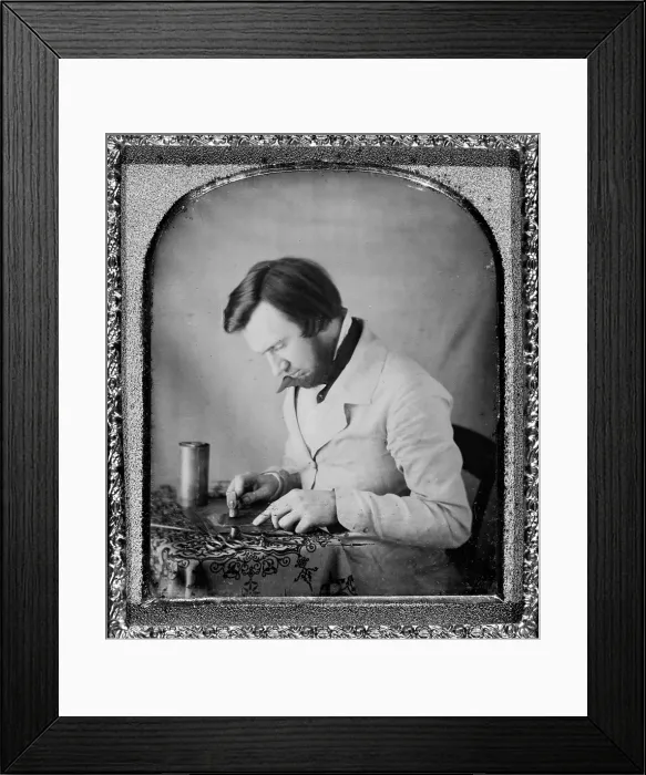 Framed Print : Occupational portrait of a tinworker seated at table with tablecloth, working with a mallet, snips, compass, and metal cylinder. sixth plate daguerreotype ca 1950s Framed Print : Occupational portrait of a tinworker seated at table with tablecloth, working with a mallet, snips, compass, and metal cylinder. sixth plate daguerreotype ca 1950s