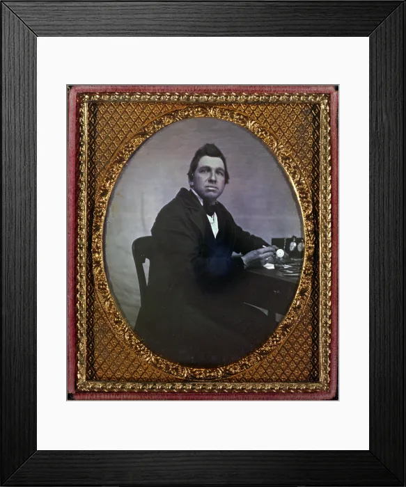 Framed Print : Occupational portrait of a watchmaker, seated at table with watches. sixth plate daguerreotype ca. 1840-1860 Framed Print : Occupational portrait of a watchmaker, seated at table with watches. sixth plate daguerreotype ca. 1840-1860