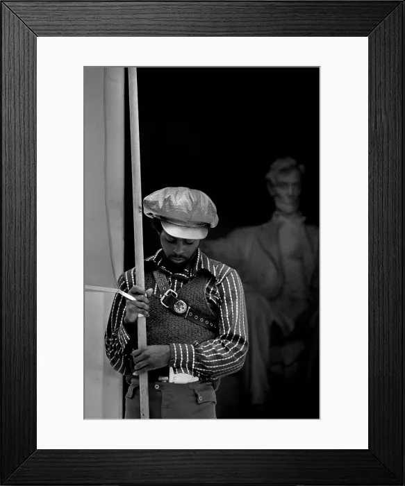 Framed Print : Black Panther convention, a man on the steps of the Lincoln Memorial holding a banner for the People's Constitutional Convention, by Thomas J. O'Halloran  /  Warren K