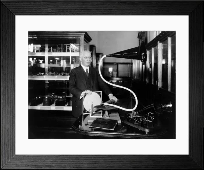 Framed Print : Emile Berliner with the model of the first phonograph machine which he invented c. 1920