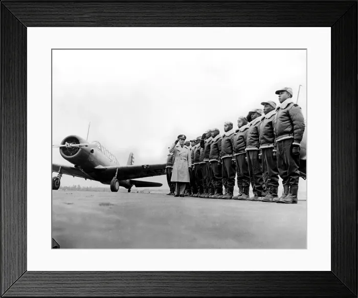 Framed Print : Tuskegee, Alabama: The 99th Pursuit Squadron. Major James A. Ellison returns the salute of Mac Ross, 1 / 23 / 42.. Courtesy: CSU Archives  /  Everett Collection