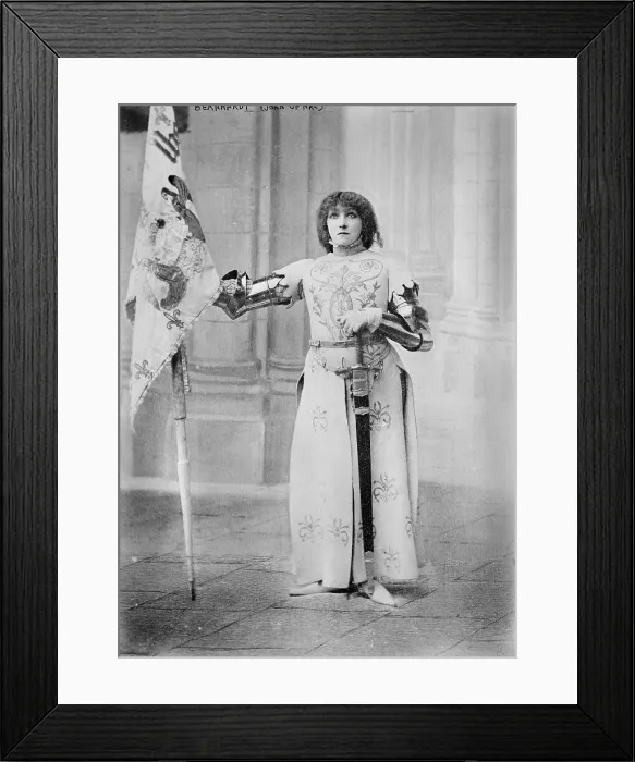 Framed Print : Sarah Bernhardt (1844-1923), French actress, dressed in costume as Joan of Arc, holding a flag, 1900
