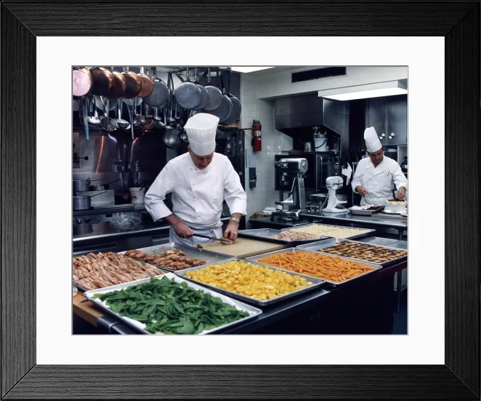 Framed Print : Chef Hans Raffert and Chef Roland Mesnier Prepare the State Dinner for President and Mrs. Aylwin of Chile, 05 / 13 / 1992