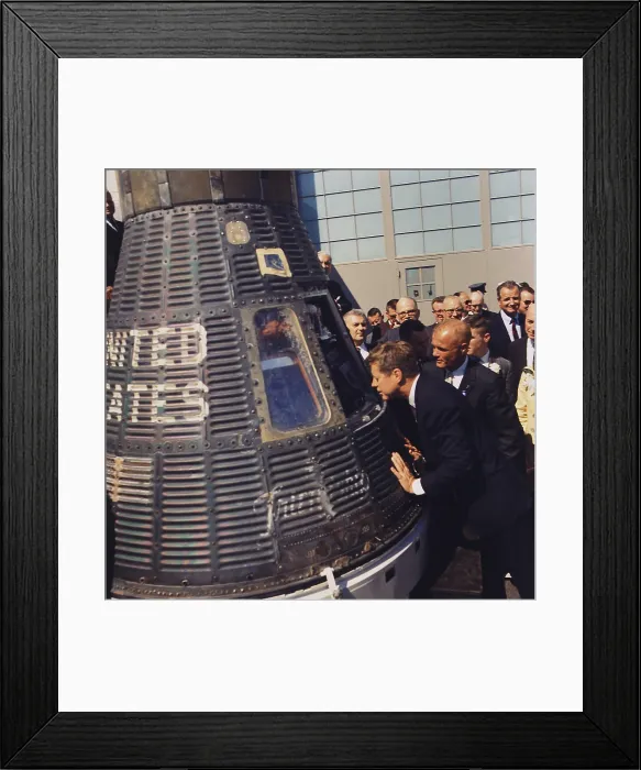 Framed Print : President Kennedy inspects interior of Friendship 7, the Project Mercury space capsule manned by John Glenn, the first American to orbit the Earth in space. May 8, 1961