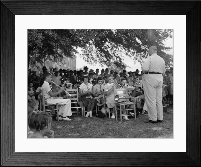 Framed Print : A band leader and his band, original caption: The high school band had been practicing up for weeks
