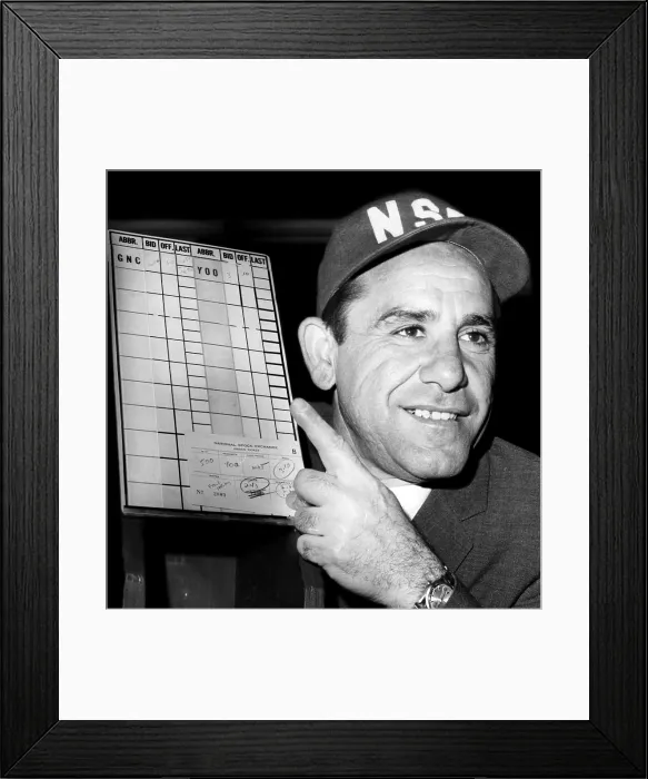 Framed Print : Yogi Berra holds up a sign with the National Stock Exchange numbers for his Yoo Hoo Beverage Corporation, 1967. Courtesy: CSU Archives / Everett Collection Framed Print : Yogi Berra holds up a sign with the National Stock Exchange numbers for his Yoo Hoo Beverage Corporation, 1967. Courtesy: CSU Archives / Everett Collection