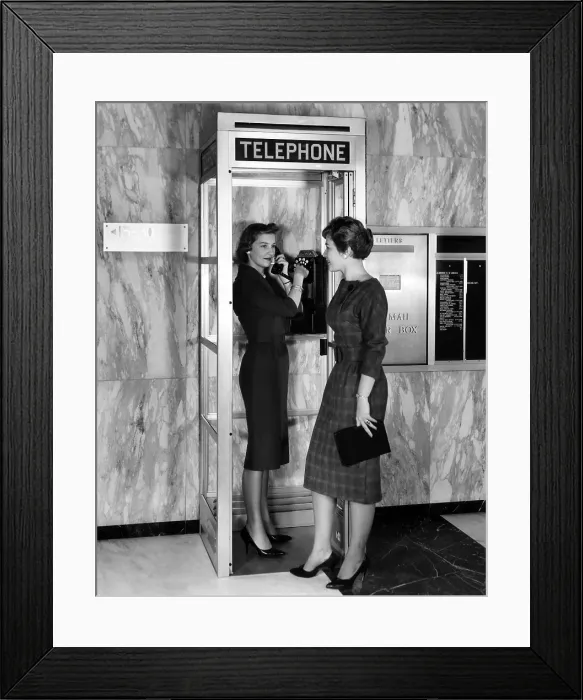 Framed Print : A new model phone booth introduced by Aluminum Company of American made for smaller locations than traditional phone booths, circa 1960s. Courtesy: CSU Archives / Everett Collection