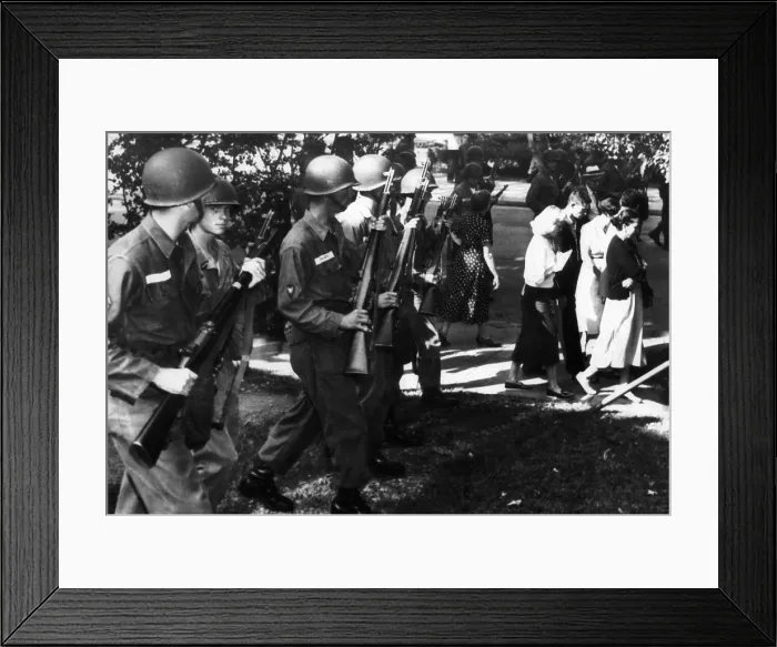 Framed Print : Troopers order parents and students who joined a protest march at Central High School in Little Rock, Arkansas to move away from school grounds