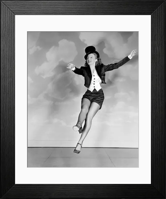 Framed Print : THE JOLSON STORY, Evelyn Keyes, rehearsing her dance moves for the photographer, 1946