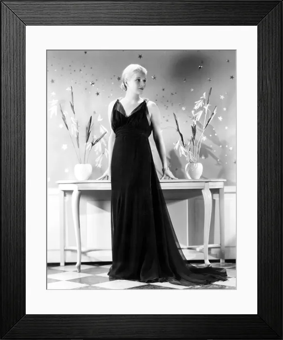 Framed Print : THE LADY CONSENTS, Ann Harding, in a black chiffon gown with diamante shoulder clips by Bernard Newman, 1936