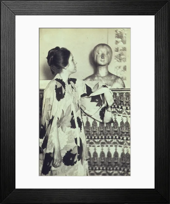 Framed Print : Woman in a kimono standing looking at a sculpted bust, photograph by Eva Watson Schutze, 1900