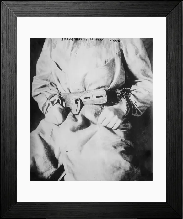 Framed Print : Detail of belt and handcuffs on an insane person, Fool's Tower (aka The Narrenturm), Vienna, Austria, circa 1900-1920s Framed Print : Detail of belt and handcuffs on an insane person, Fool's Tower (aka The Narrenturm), Vienna, Austria, circa 1900-1920s