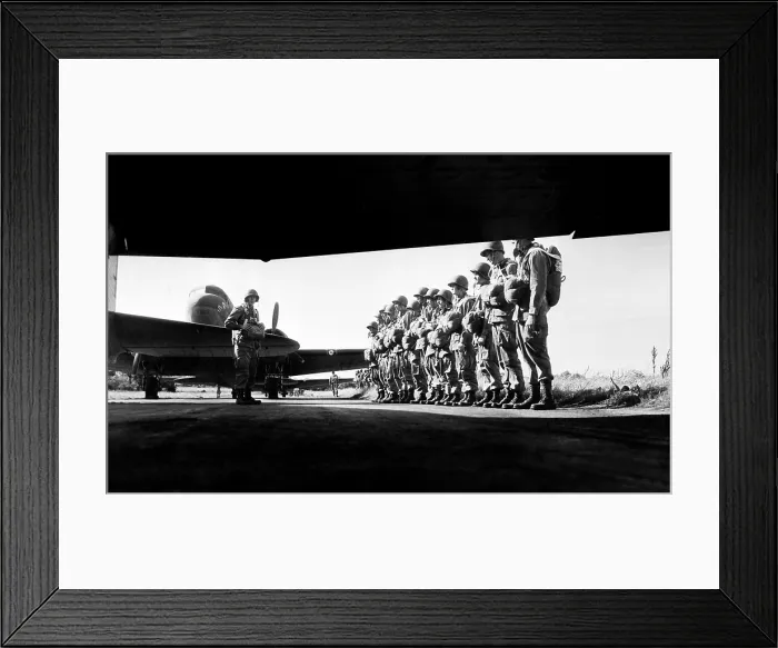 Framed Print : U.S. paratroopers lining up before taking off on training maneuvers somewhere in England, ca. 1942