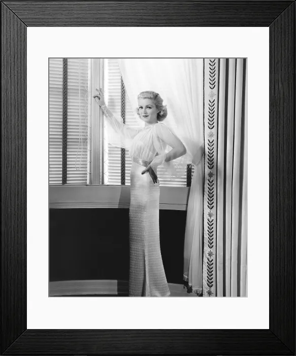 Framed Print : NAVY WIFE, Claire Trevor in formal hostess pajama designed by Helen Myron, 1935, TM & Copyright 20th Century Fox Film Corp. / courtesy Everett Collection