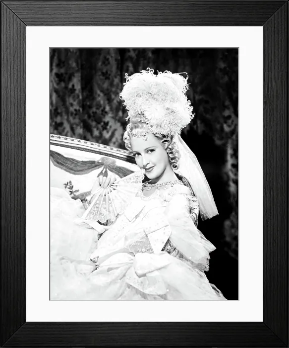 Framed Print : NEW MOON, Jeanette MacDonald, in a costume by Adrian, 1940 Framed Print : NEW MOON, Jeanette MacDonald, in a costume by Adrian, 1940