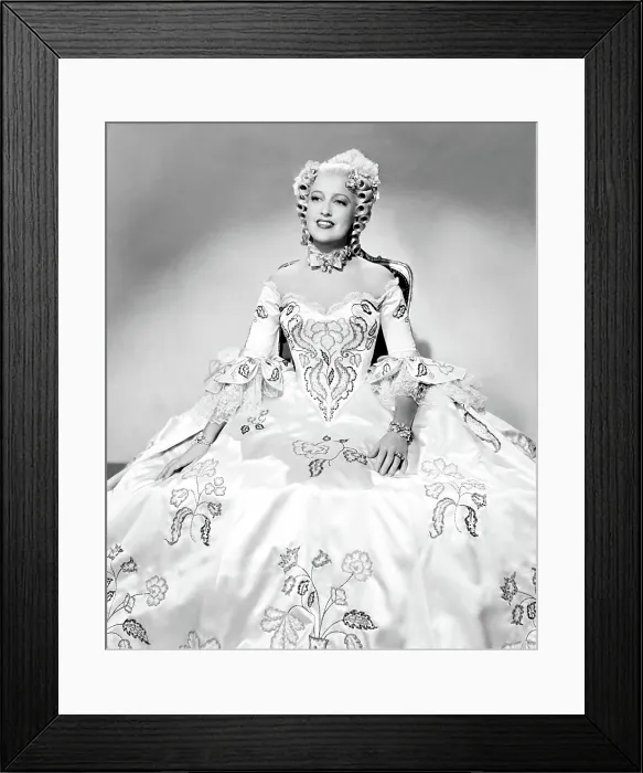 Framed Print : NEW MOON, Jeanette MacDonald, in a costume by Adrian, 1940