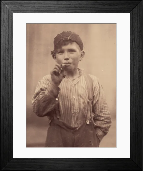 Framed Print : Portrait of a boy smoking, original caption: John Tidwell, a Cotton Mill Product. Doffer in Avondale Mills