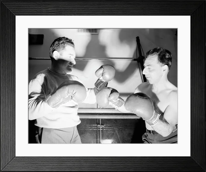Framed Print : Boxing. Boxing instructor, Maurice Case, giving instructions to Joe Brun at the Lighthouse, an institution for the blind, at 111 East Fifty-ninth Street. ca 1944 Framed Print : Boxing. Boxing instructor, Maurice Case, giving instructions to Joe Brun at the Lighthouse, an institution for the blind, at 111 East Fifty-ninth Street. ca 1944