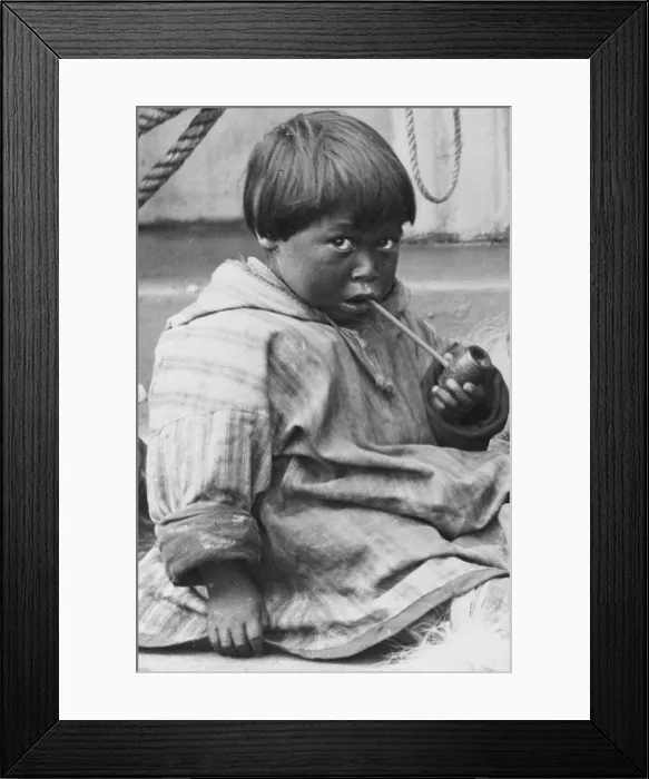 Framed Print : Child learning to smoke a pipe, detail of a native American child smoking a pipe, photograph by Samuel J. Call, 1897