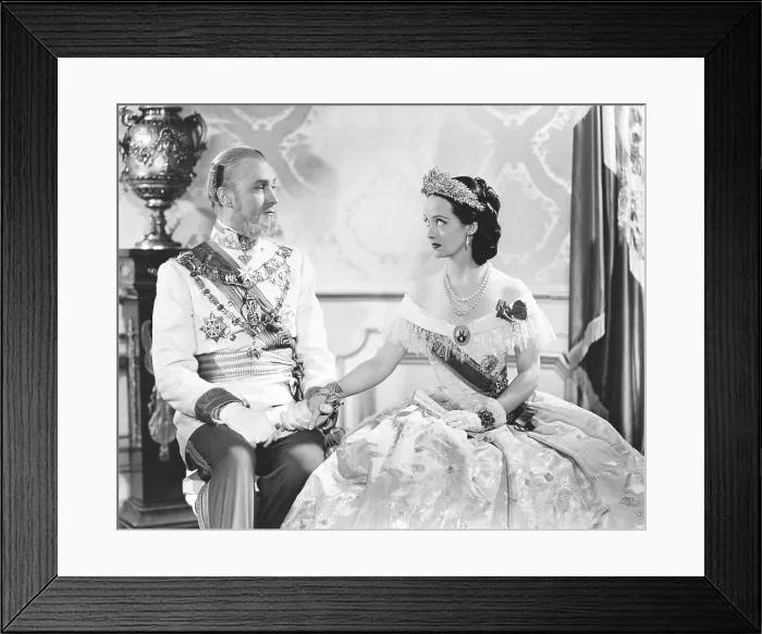 Framed Print : JUAREZ, from left, Briah Aherne, Bette Davis, 1939