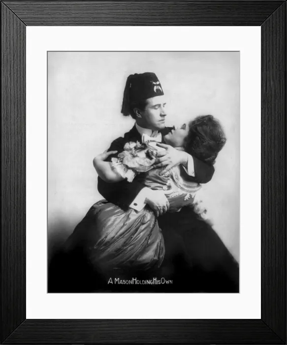 Framed Print : Man with a fez embracing a woman, original title: A Mason Holding his own, May 18, 1908