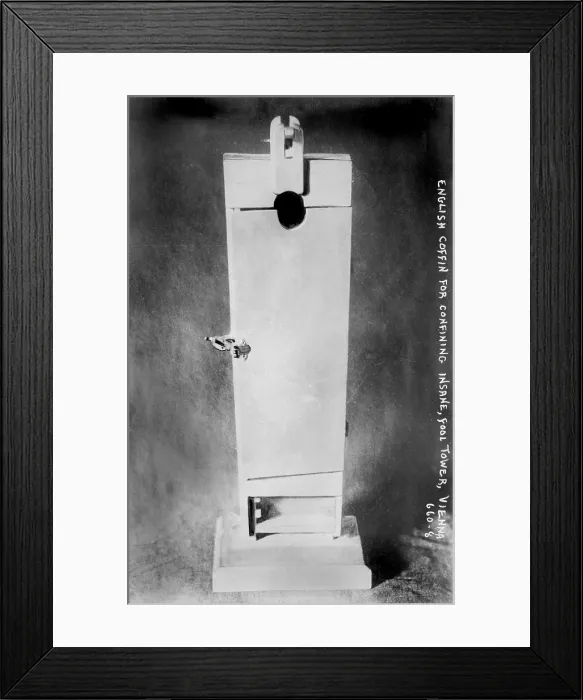 Framed Print : English coffin for confining the insane, from Fool's Tower (aka The Narrenturm), home for mental patients, Vienna, Austria, photograph circa 1900-1920s Framed Print : English coffin for confining the insane, from Fool's Tower (aka The Narrenturm), home for mental patients, Vienna, Austria, photograph circa 1900-1920s