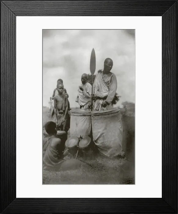 Framed Print : King of Uganda (back center) and the royal drummer (right) with his ears cut off by order of the former king, Uganda, Africa, photograph circa 1890s-1920s Framed Print : King of Uganda (back center) and the royal drummer (right) with his ears cut off by order of the former king, Uganda, Africa, photograph circa 1890s-1920s