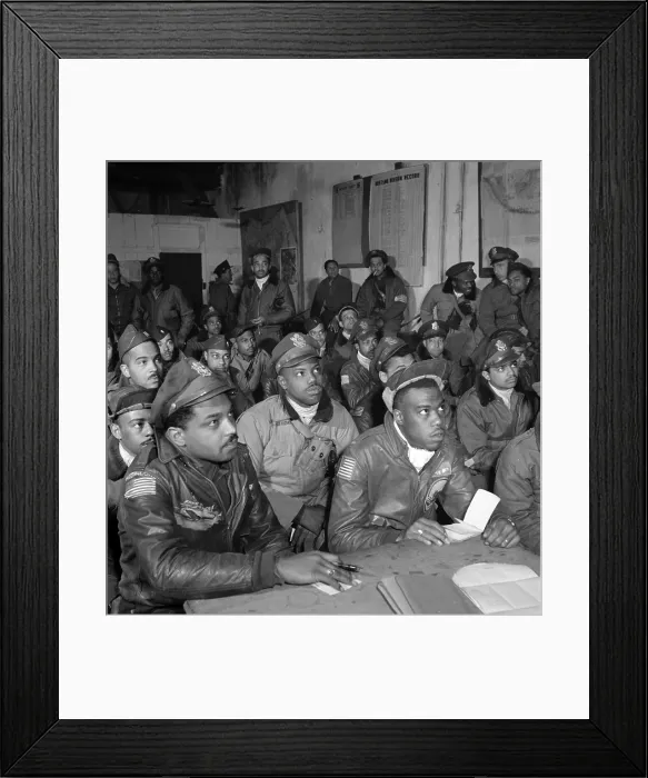 Framed Print : Tuskegee airmen attend a briefing in Ramitelli, Italy, March 1945. Photograph by Toni Frissell